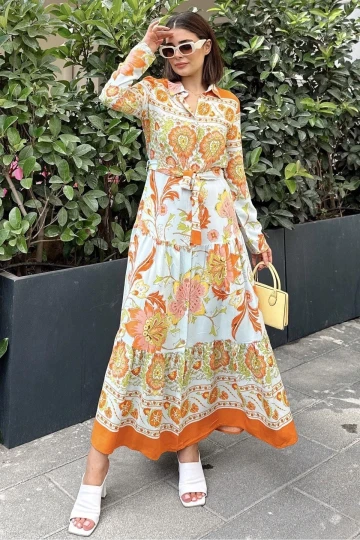 Kadın Turuncu Desenli Gömlek Yaka, Uzun Kol, Eteği Pliseli, Beli Kuşaklı, Salaş Kesim, Uzun Elbise