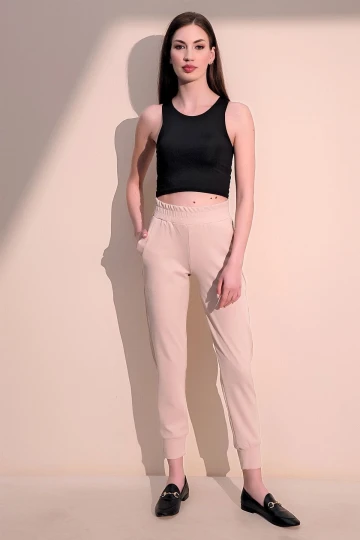 Kadın Bej Rahat Dokulu Kumaş Cepli Beli Lastikli Paça Jogger Spor Pantolon